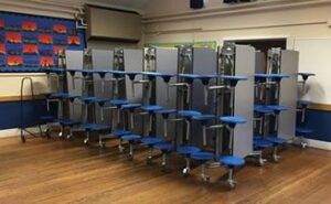 Fold-away school tables with integrated seating