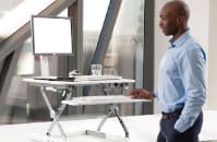 Back care office solutions from Source One... sit-stand desk, desk risers and more