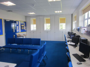 White Spire School wallspace built around window