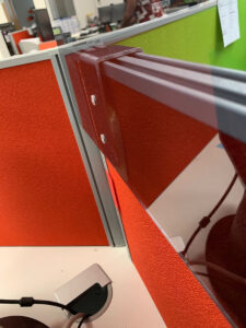 Fitting to existing screen. Covid-19 office screens fitted at Activity Superstore