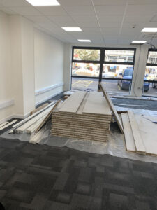 3. Partitioning delivery, protective sheets on new carpet