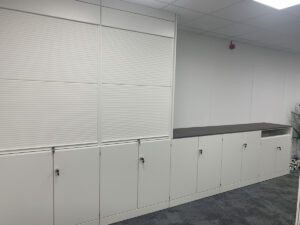 21. Storagewall and worktop station