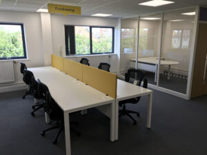 Office desking, chairs, glass wall partition
