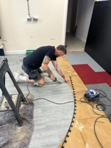Carpet tile fitting. Lindner Prater refurbishment