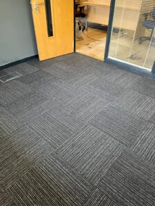 Meeting room fFooring being laid. Lindner Prater refurbishment