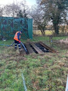 Sucking out old reed bed infiltration plant