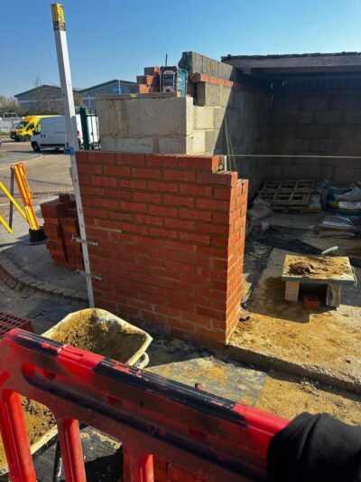Bin store wall being rebuilt