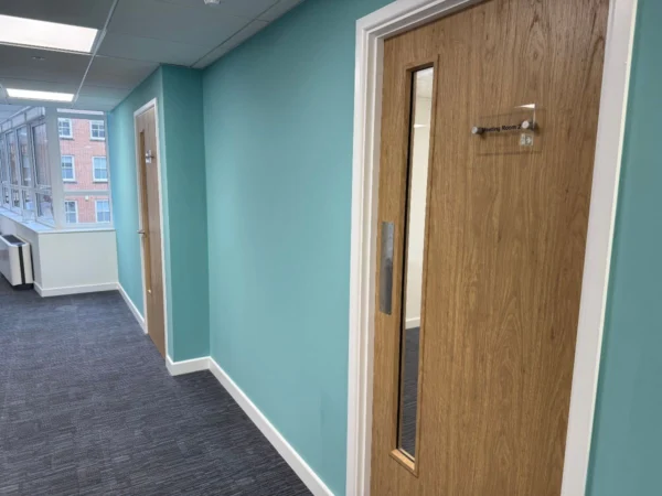 Meeting room doors, signage, painted and decorated walls,